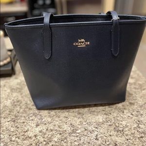 Beautiful navy Coach purse-like new!